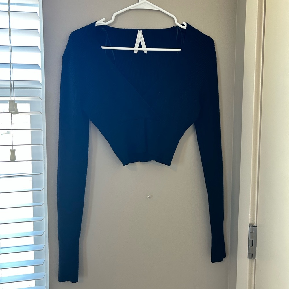 Black cross front cropped sweater